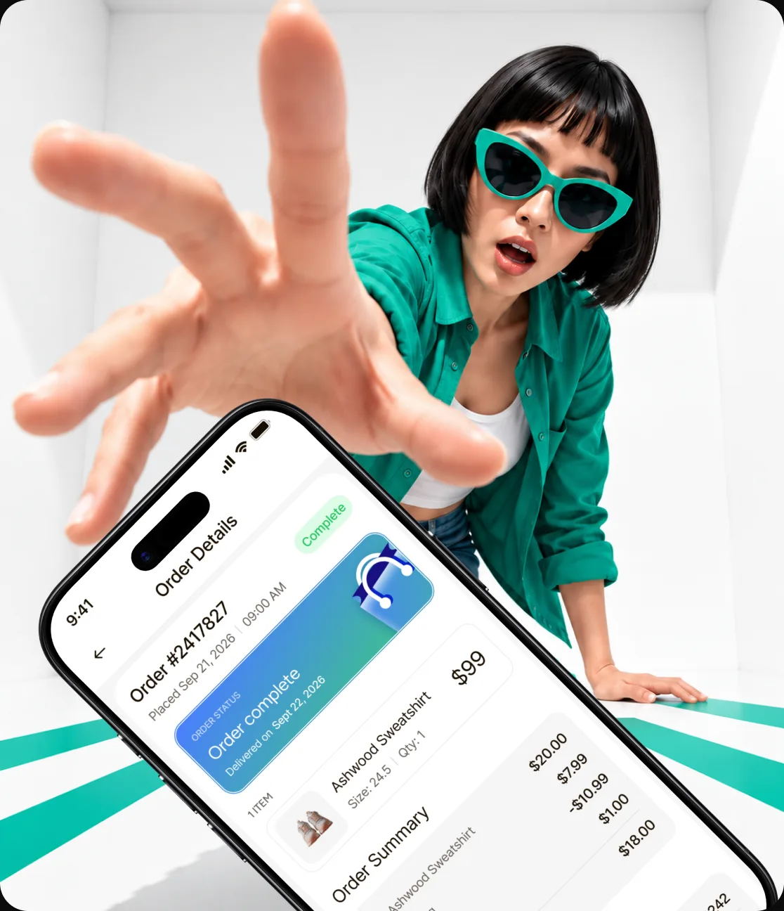 Shopper reaching out next to a phone showing a completed order